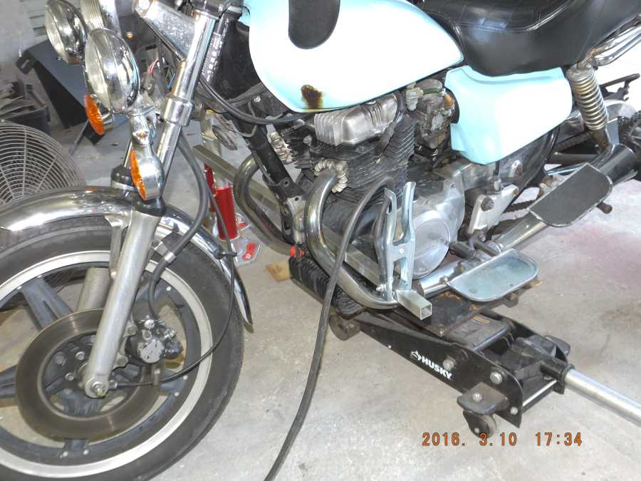Stainless steel motocycle welding, leg rests and foot pegs. 