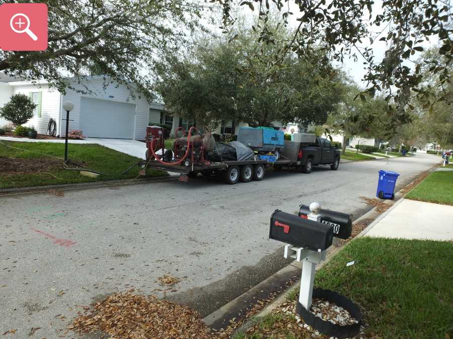 Sandblasting concrete driveway paint removal stripping