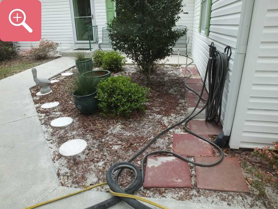 Sandblasting concrete driveway paint removal stripping