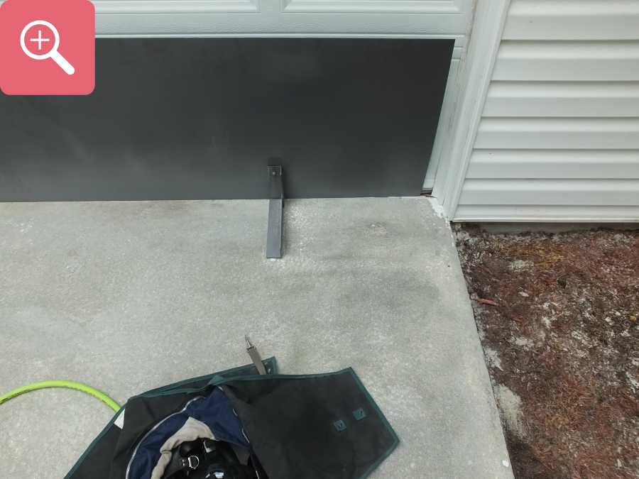 Sandblasting concrete driveway paint removal stripping