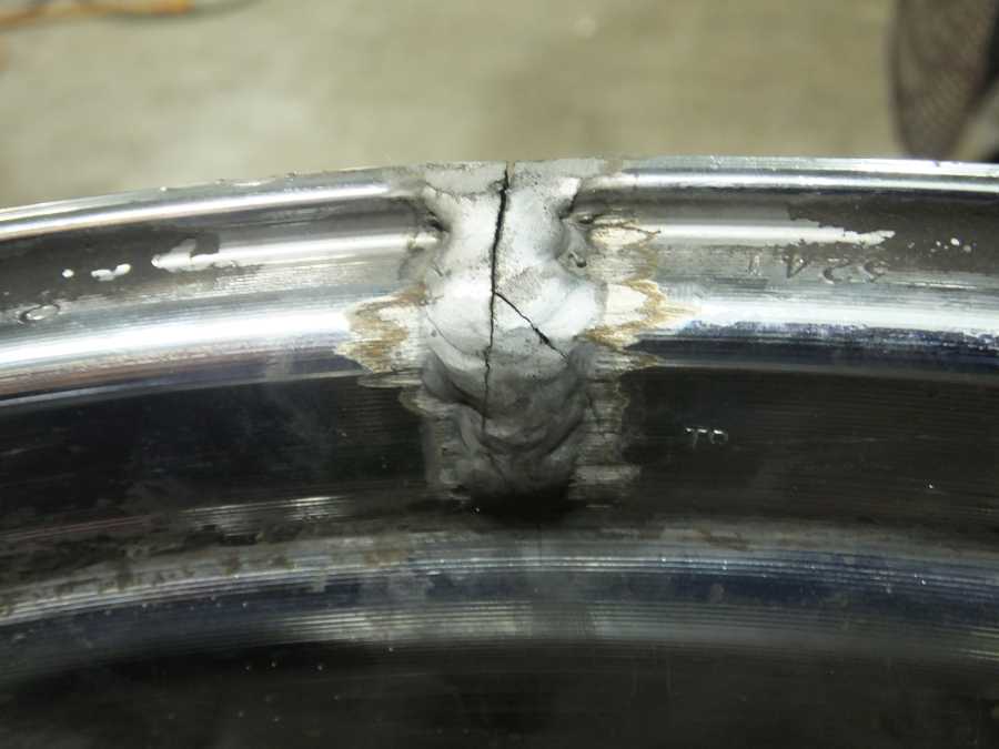 Cadillac aluminum wheel rim repair welding.