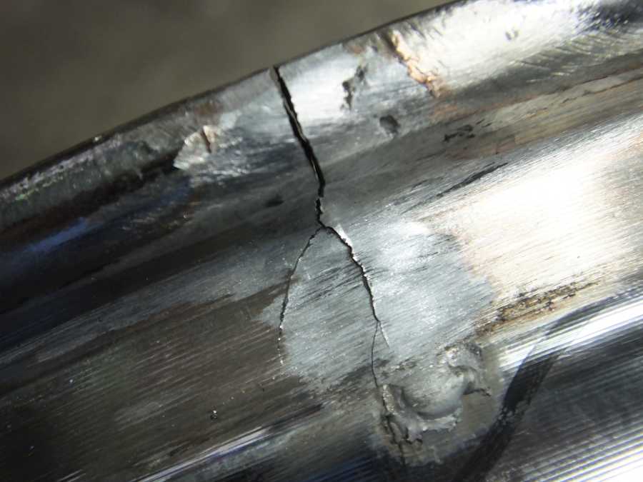 Cadillac aluminum wheel rim repair welding.