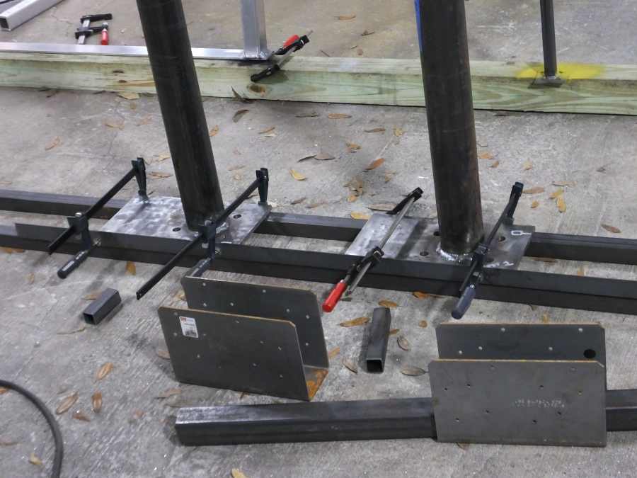 Fabricating steel suport columns. 