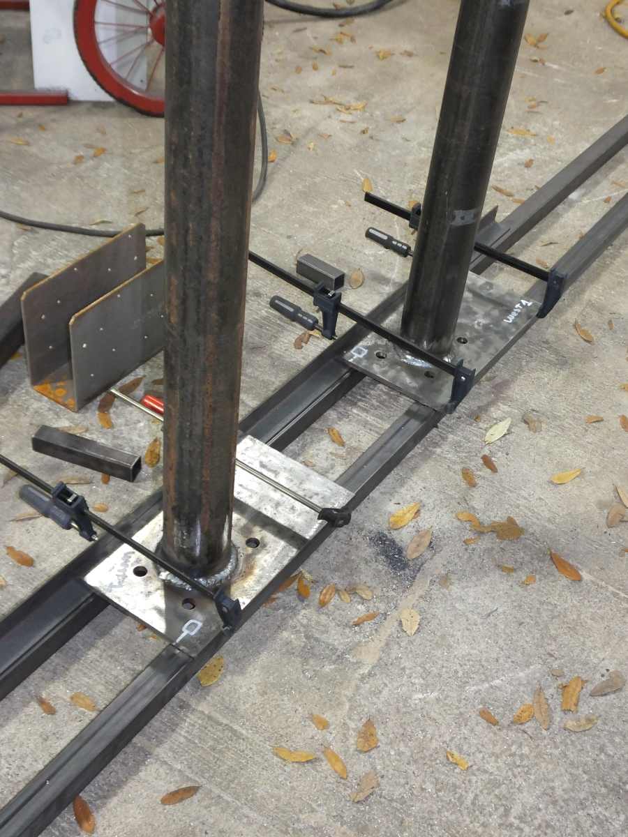 Fabricating steel suport columns. 