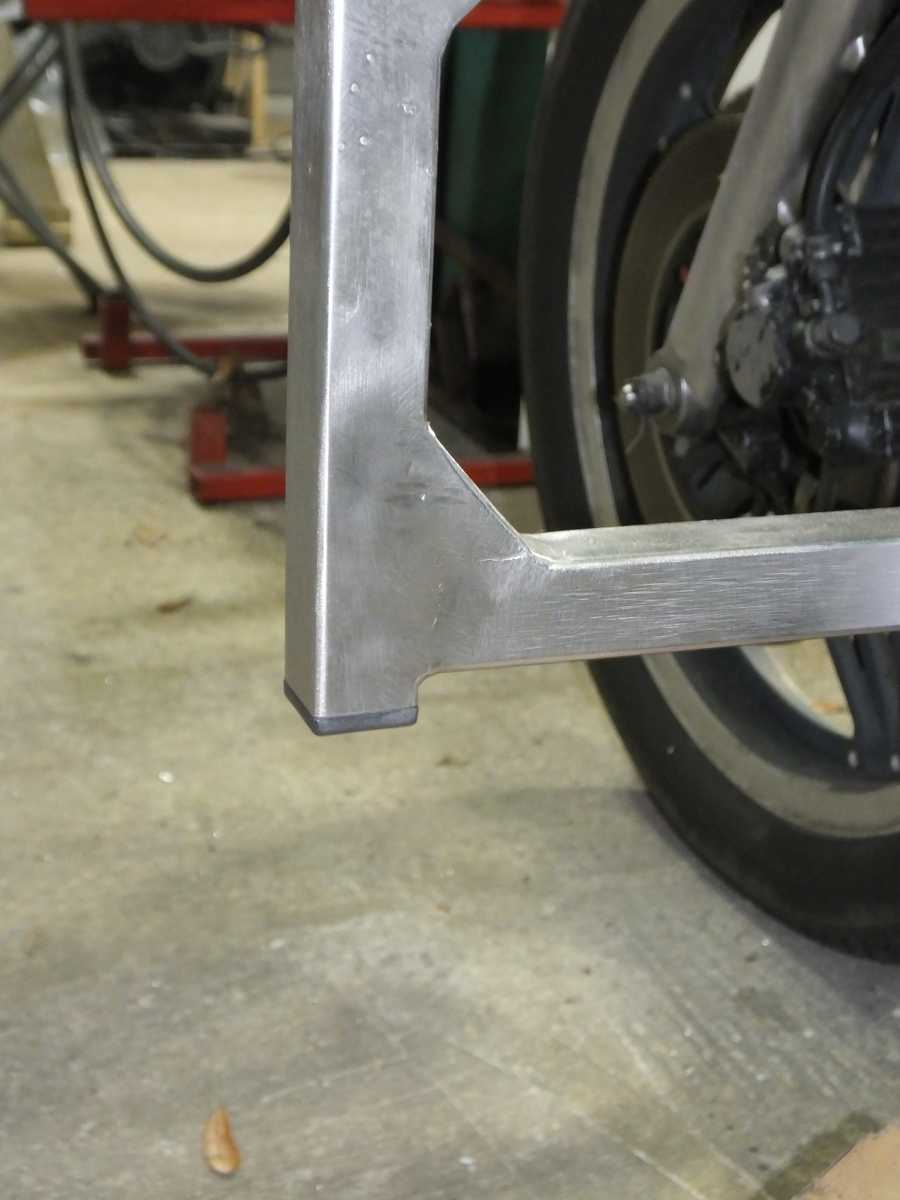 Stainless steel motocycle welding, leg rests and foot pegs. 