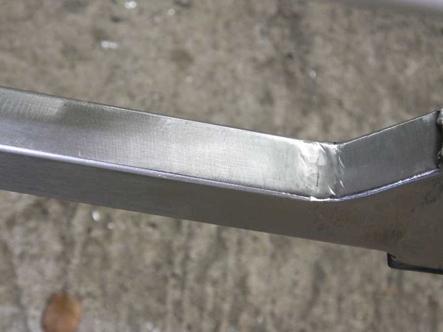 Stainless steel motocycle welding, leg rests and foot pegs. 