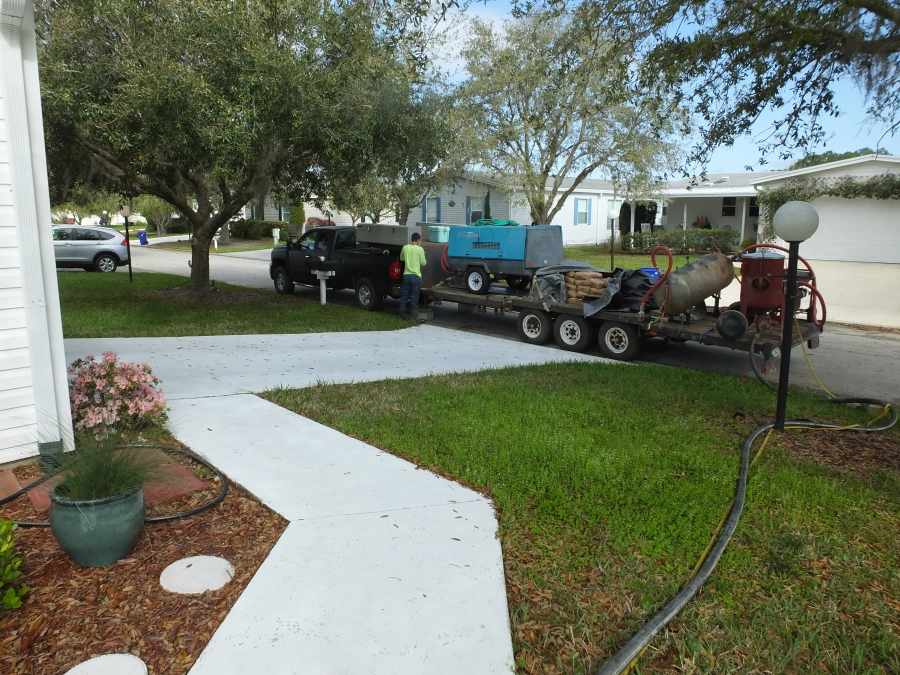 Before sandblasting a sidewalk. 