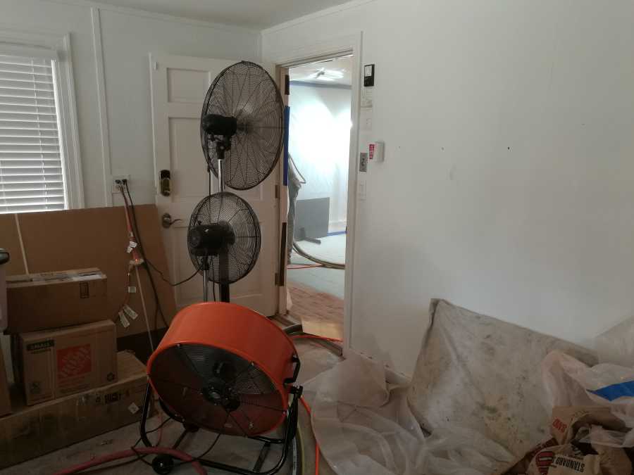 Ventilating a room thats being sandblasted.
