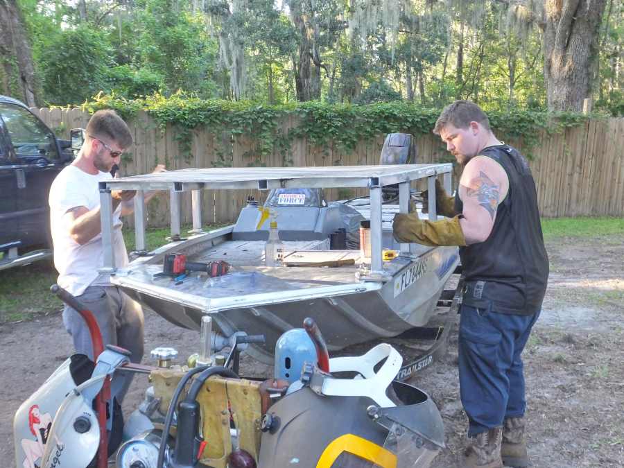 Welding, fabricating a bow fishing, gigging platform.