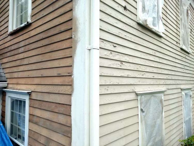 Blasting paint off a wood house