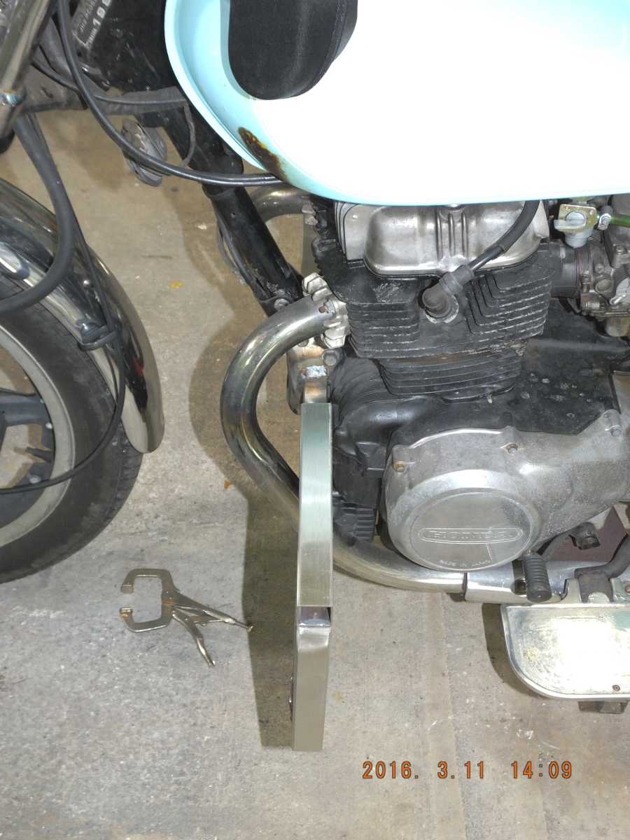 Stainless steel motocycle welding, leg rests and foot pegs. 