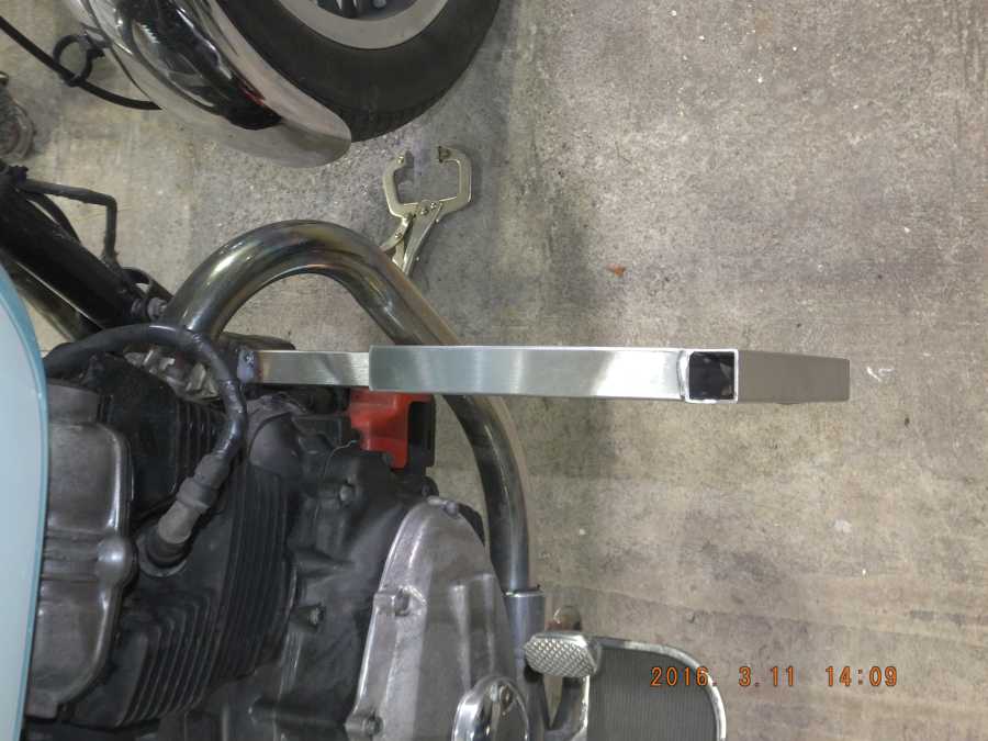 Stainless steel motocycle welding, leg rests and foot pegs. 